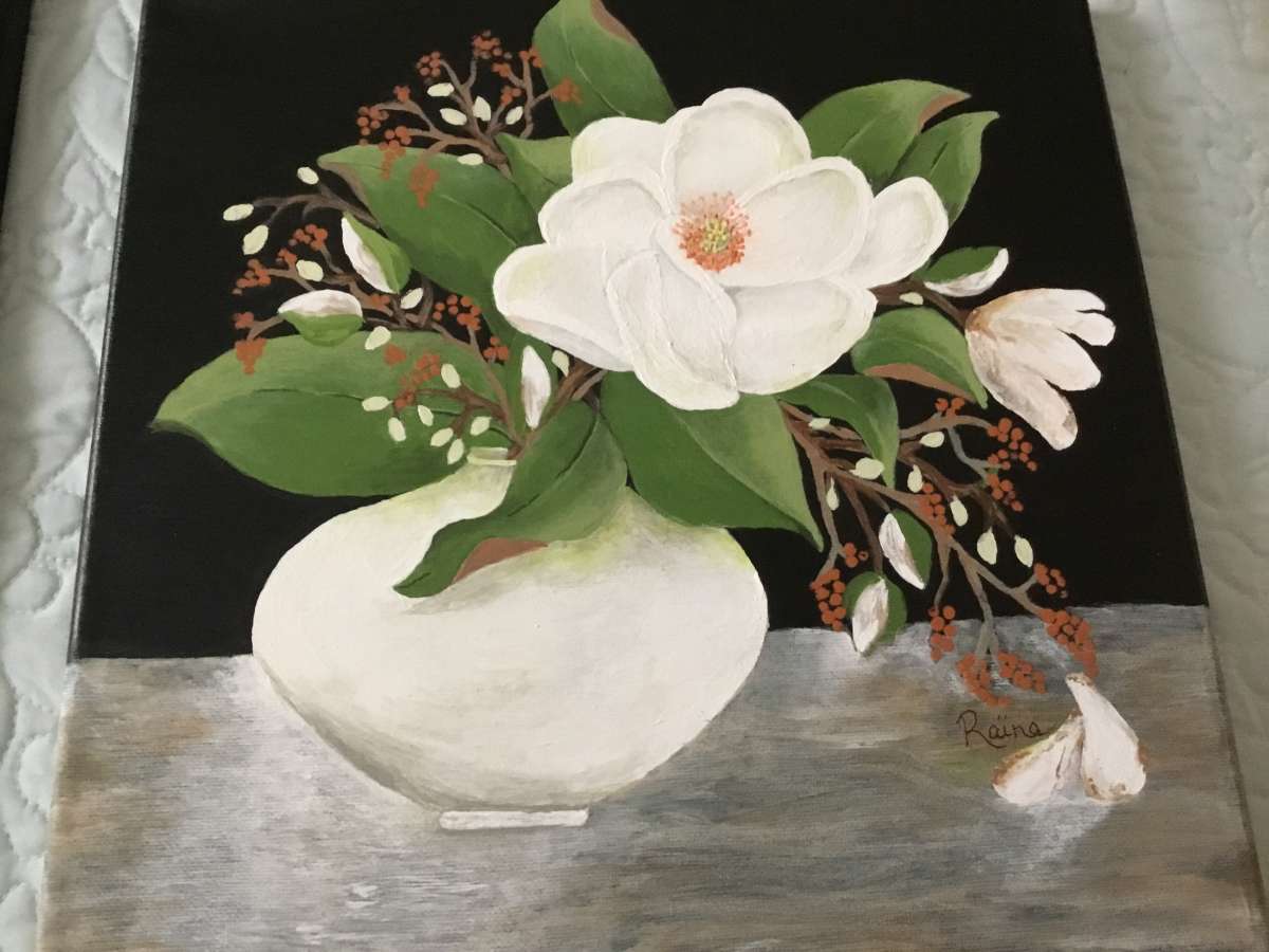 White magnolia in white pottery